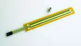 Bild 1: Ersetzt man das klassische Schleifersystem durch eine Kollektorfolie, die mit einem mechanischen Stift gegen die Widerstandsbahn gedrückt wird, erhält man auch hier ein weg- bzw. winkelproportionales Ausgangssignal.