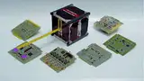 Bild 1: Der Picosatellit MASAT-1 ist annähernd ein Würfel mit 10 cm Kantenlänge und wiegt etwa 1 kg