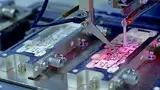 Bild 1: Mikromontage einer flexiblen Schaltung 