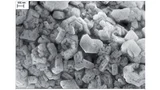 MnO2-Kathodenschicht der hermetisch dichten 100-μF-/ 35-V-Kondensatoren im Keramikgehäuse, im Zustand nach dem Lebensdauertest (230 °C, 1.000 h @ 0,5 × UR).