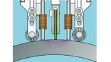 Prinzipieller Messaufbau: zwei Spulen zur Vormagnetisierung der Oberfläche (Abstand 18 mm), dazwischen Array mit GMR-Sensoren