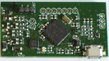 Realisierung der Strommessschaltung mit dem Mikroprozessor MSP430 auf einer Experimentalplatine. Messbereich: 100 nA bis 30 mA