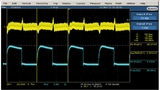 Bild 1: Lastsprung von 3 A (gelb: Uout; cyan: Iout) bei Uin = 5 V, Uout = 1,2 V und L = 330 nH