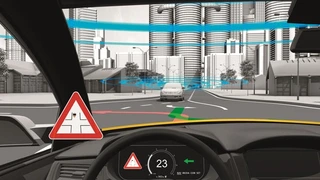Linksabbiegeassistent auf Basis der Fahrzeug-zu-X-Kommunikation.