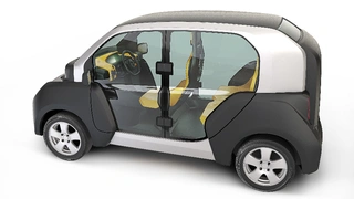 Im Elektrokleinswagen CITY-eTaxi finden drei Personen Platz.