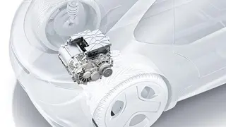 Der elektrische Achsantrieb (eAchse) von Bosch kann die Reichweite von Elektroautos erhöhen. Warum? Der Zulieferer hat aus drei Antriebsteilen eins gemacht: Motor, Leistungselektronik und Getriebe sind kompakt kombiniert und treiben unmittelbar die A