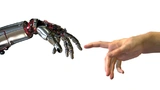 In zukünftigen Produktionshallen werden Roboter und Menschen eng zusammenarbeiten. 
