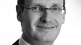 Mark_Hakim von Qosmotec