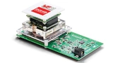Das Wireless-Power Evaluierungs-Kit von Rohm und Würth besteht aus einem Sender (große Leiterplatte unten) und einem Empfänger