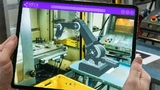 Auf einem Tablet lassen sich die Robotersysteme in der Anwendung visualisieren.