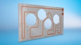 Bild 2. Die Kühlplatten sind Sonderanfertigungen und vollständig an die Getriebekontur angepasst. Sie sind 510 mm breit, 870 mm lang und 25 mm stark.