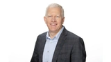 Dr. Greg Henderson, Senior Vice President des Geschäftsbereichs Automotive, Kommunikation und Luft-/Raumfahrt bei Analog Devices.