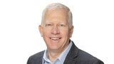 Dr. Greg Henderson, Senior Vice President des Geschäftsbereichs Automotive, Kommunikation und Luft-/Raumfahrt, Analog Devices.