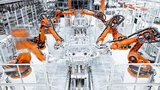 Klassische Industrieroboter von Kuka wie hier im Automobilbau müssen in Einhausungen arbeiten.