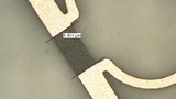 Ausschnitt eines Wilkinson-Teiler mit »Ticer«-Widerstand zwischen den Signalpfaden, um die Isolation zu verbessern.