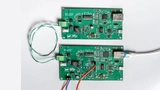 Bild 1: PSE (Board im Bild unten) und PD (Board im Bild oben) des RD041 bei der Inbetriebnahme 